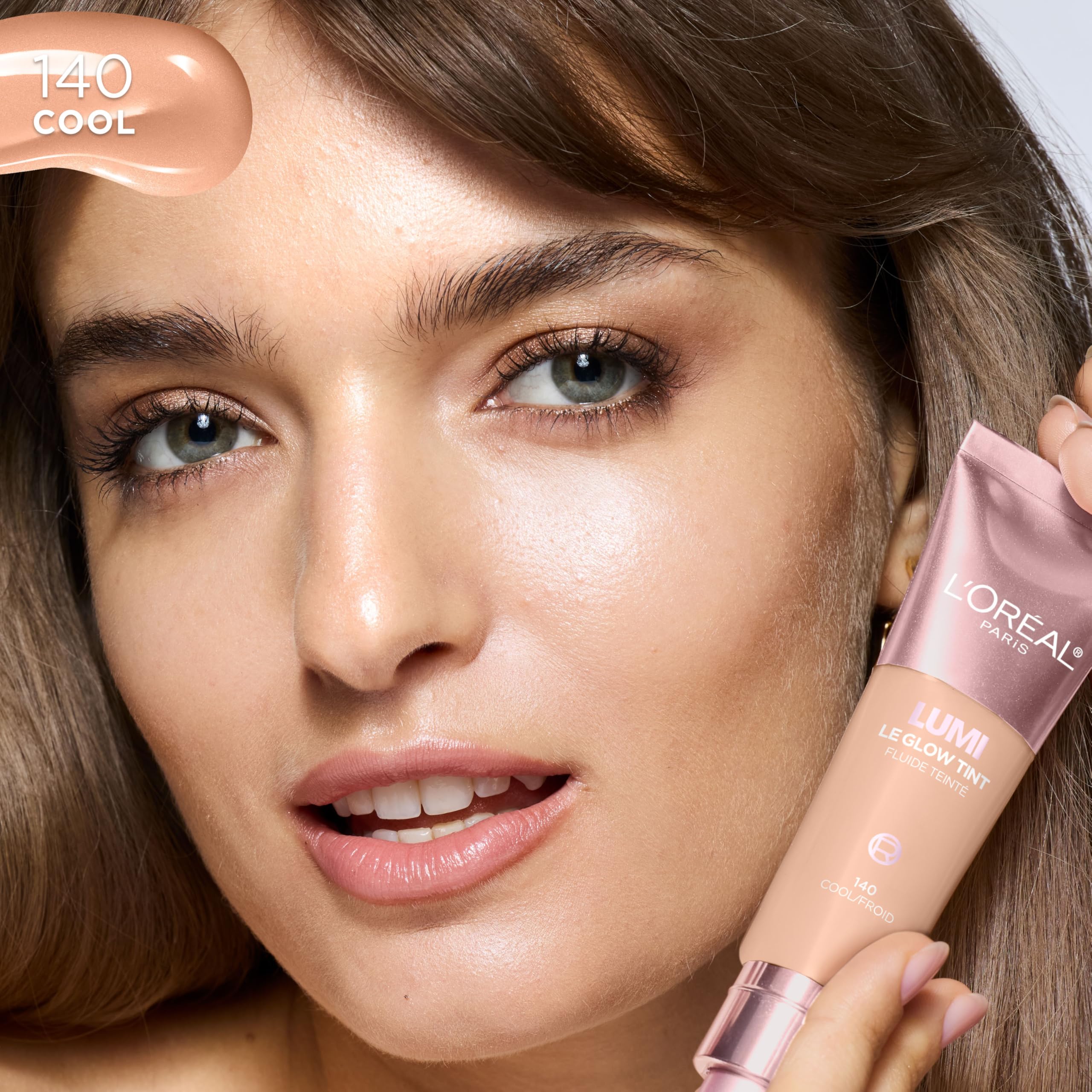 Lumi Le Glow Tint brillo luminoso con perlas reflectantes para tono suave.