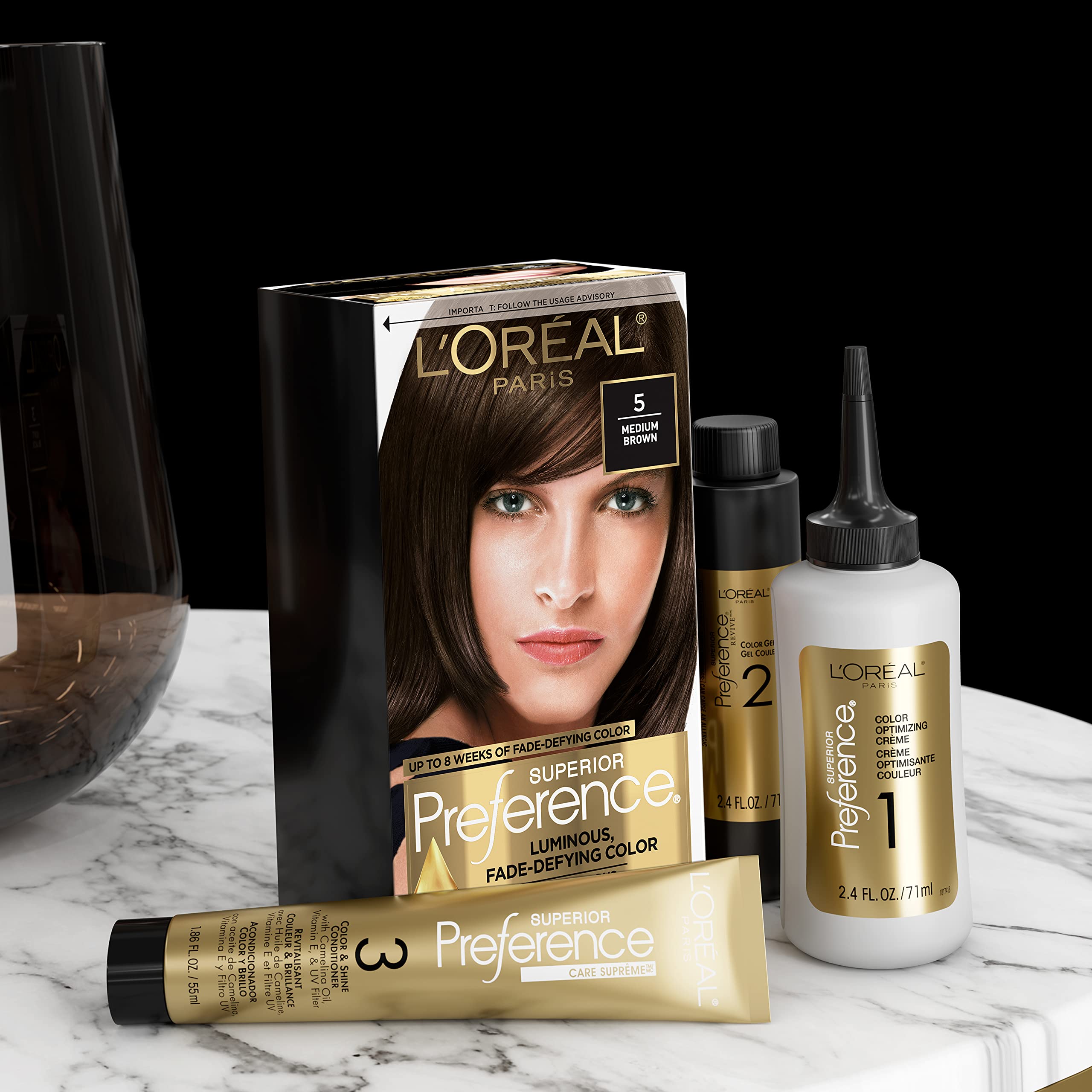 L'Oreal Paris packaging close-up highlights Shine Serum infusion for glow