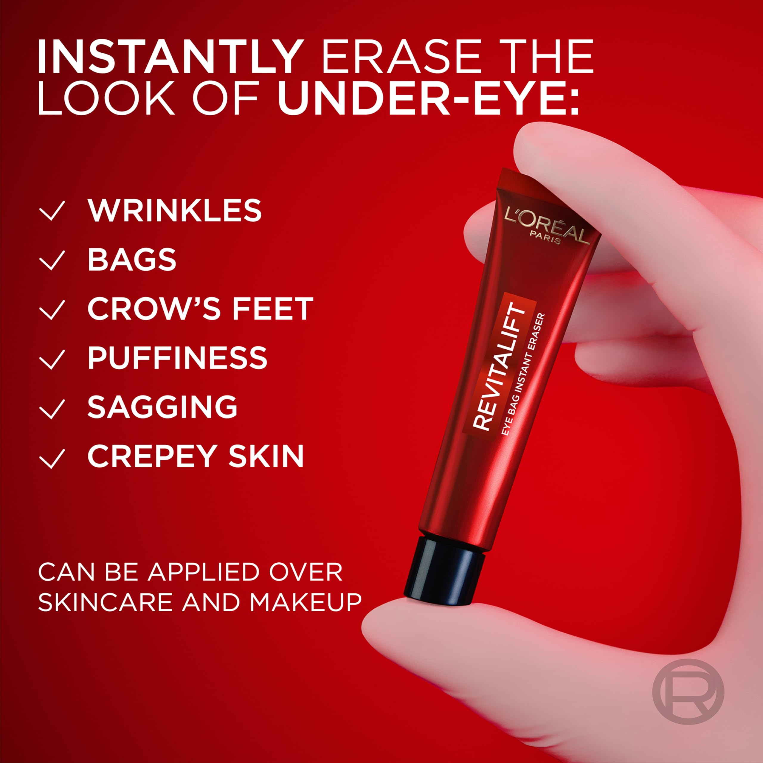 Close-up of application by L'Oreal Paris Revitalift Triple Power Eye Tightener on eye skin