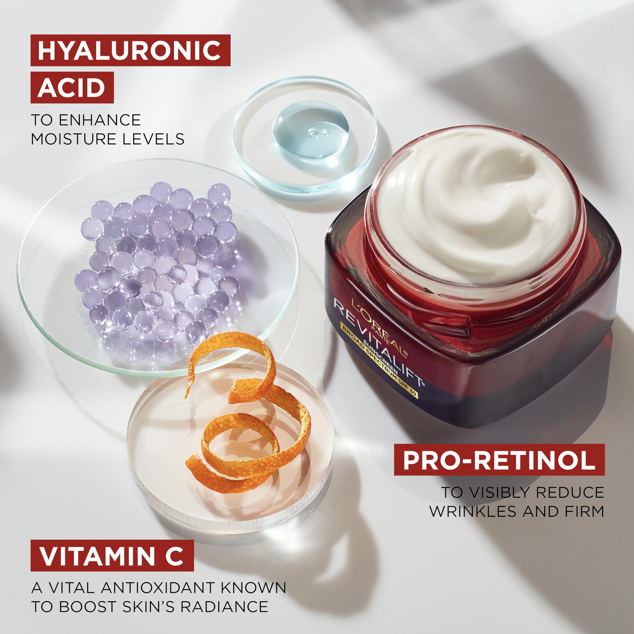 Hands applying Revitalift Triple Power on the face and neck for morning routine.