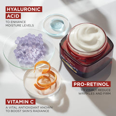 Hands applying Revitalift Triple Power on the face and neck for morning routine.