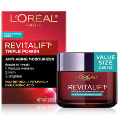 L'Oreal Paris Revitalift Triple Power jar close-up highlighting anti-aging formula.