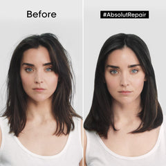 Hands applying Absolut Repair Golden Mask to hair for deep conditioning