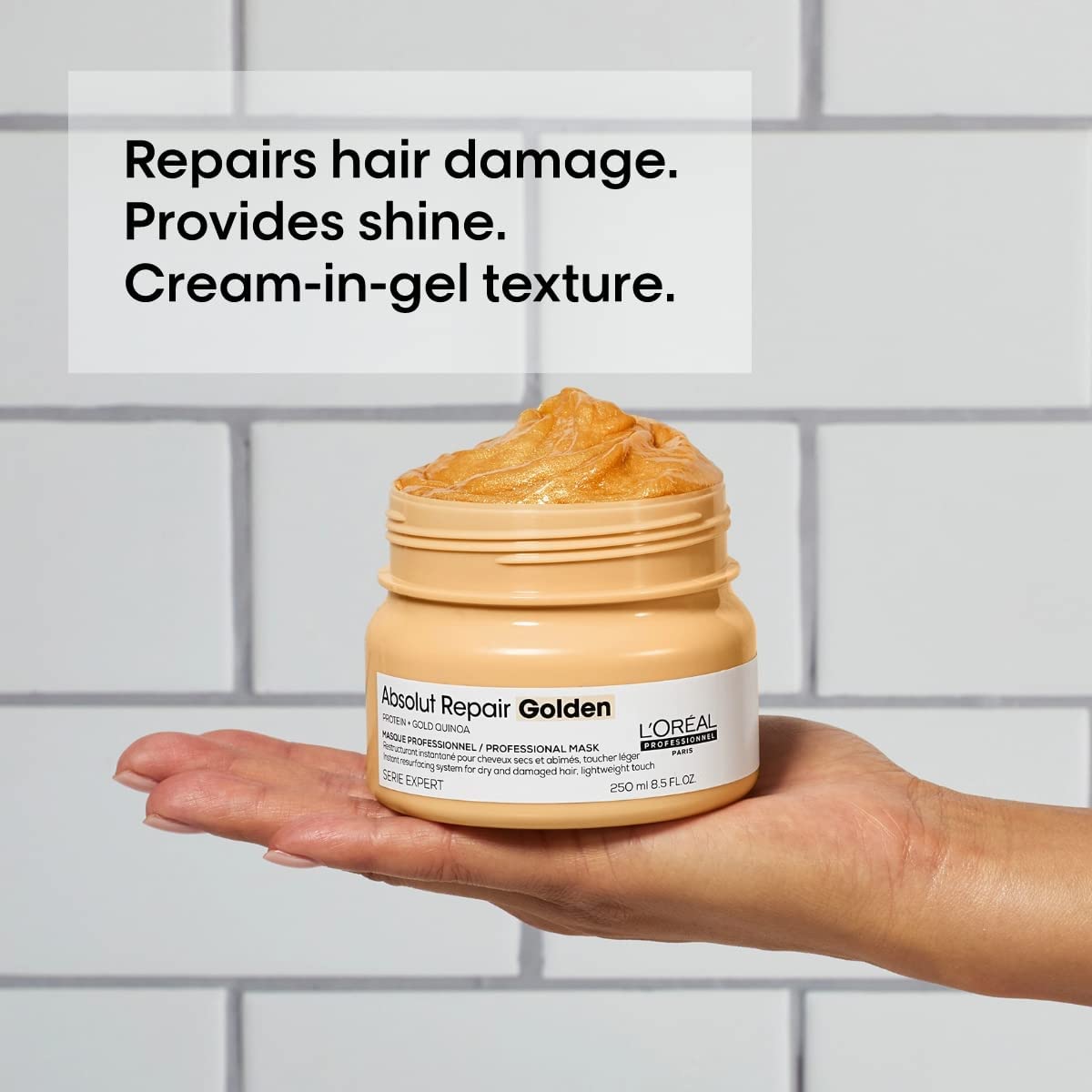 Absolut Repair Golden Mask on towel-dried hair ready for treatment