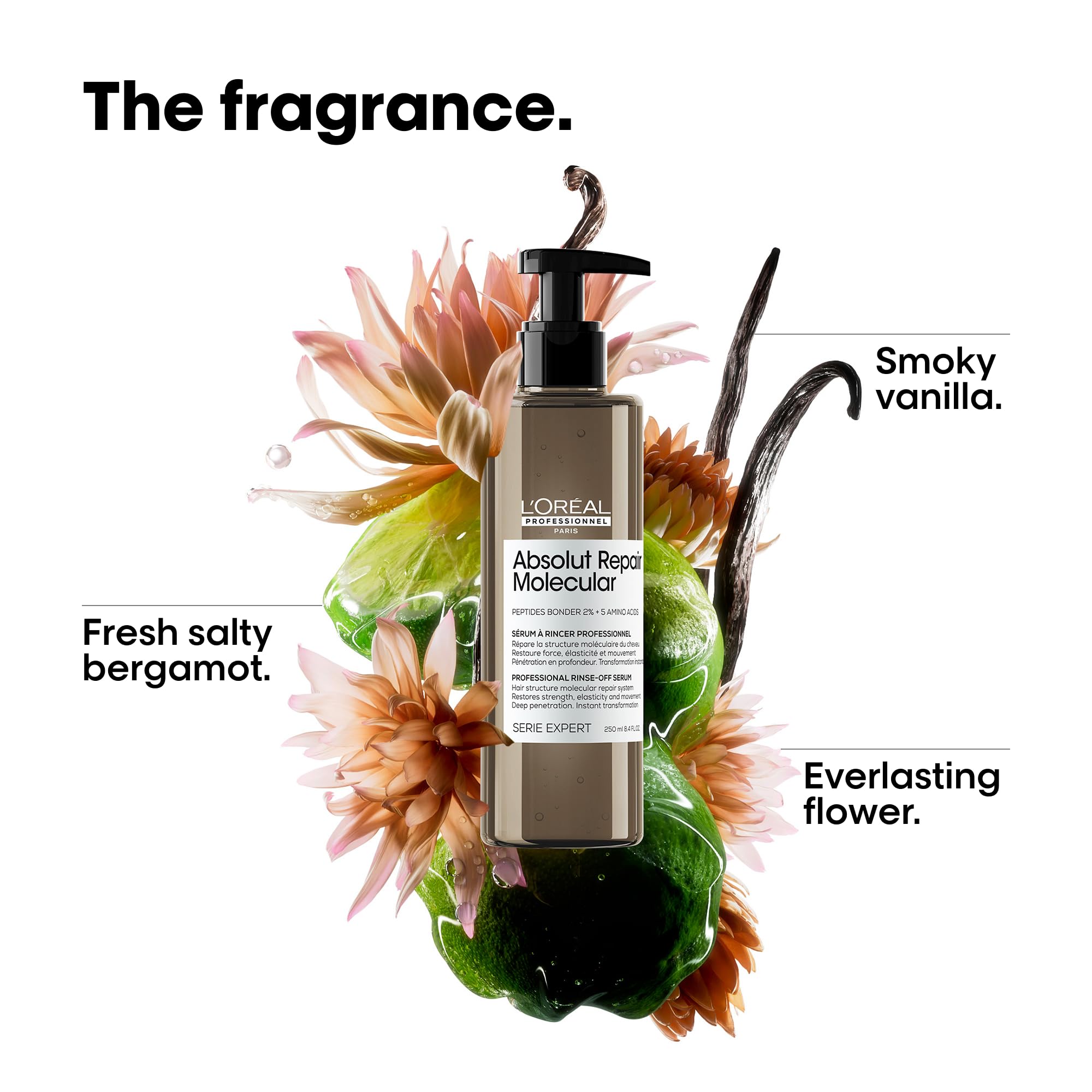 L'Oréal Professionnel Paris Absolut Repair serum on ends, smoothing and restoring movement.
