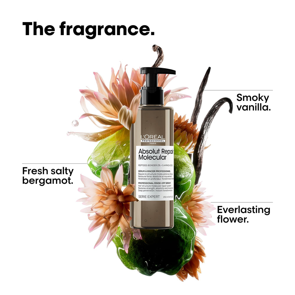 L'Oréal Professionnel Paris Absolut Repair serum on ends, smoothing and restoring movement.