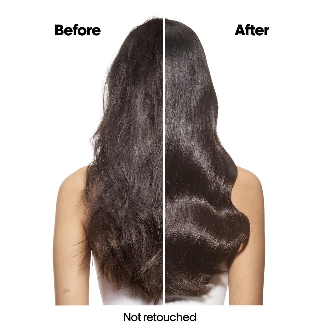 L’Oréal Professionnel Paris Absolut Repair Molecular Shampoo foam close-up showing rich lather