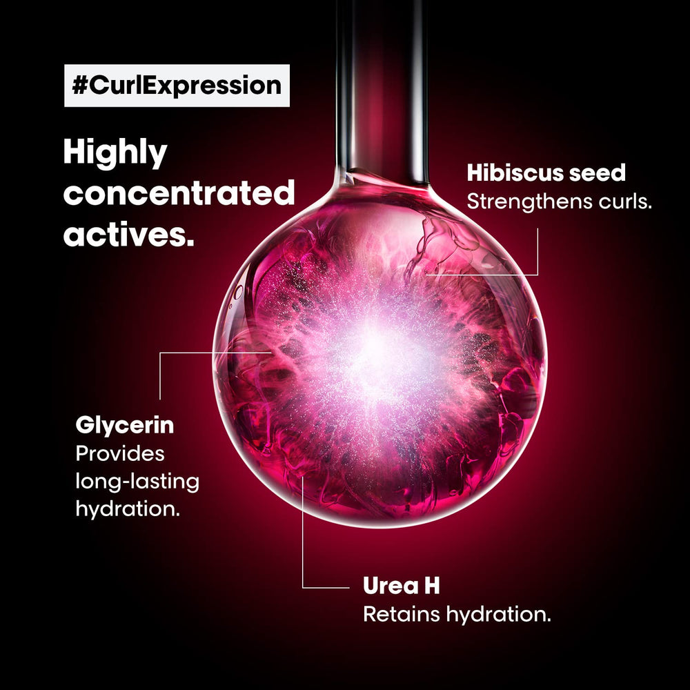 L’Oréal Professionnel Paris Curl Expression 10-in-1 Mousse protects against heat during styling.