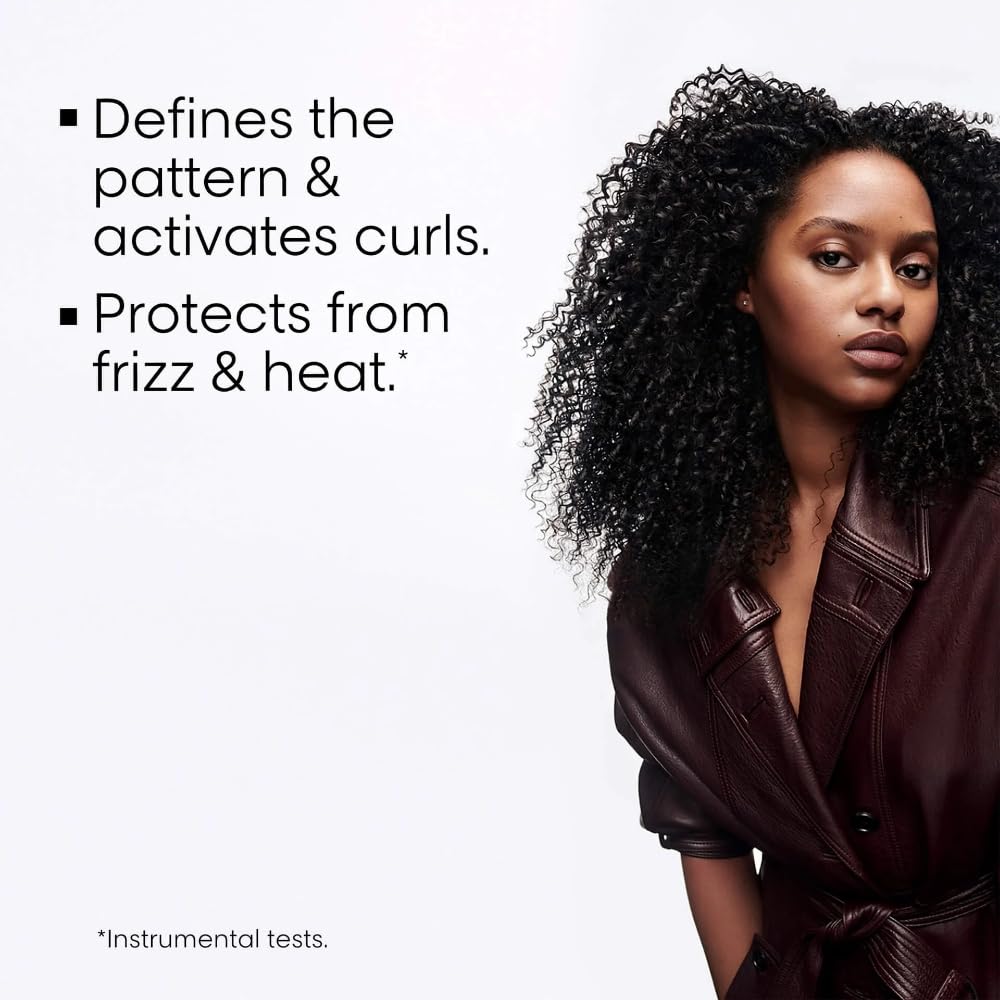 L'Oreal Professionnel Paris Curl Expression Activator with pump for easy application.