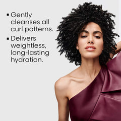L’Oréal Curl Expression shampoo lather close-up demonstrates creamy cleansing for frizz-free curls.