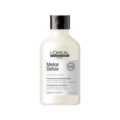 L’Oréal Professionnel Paris Metal Detox bottle pour cleanses mineral buildup and protects color