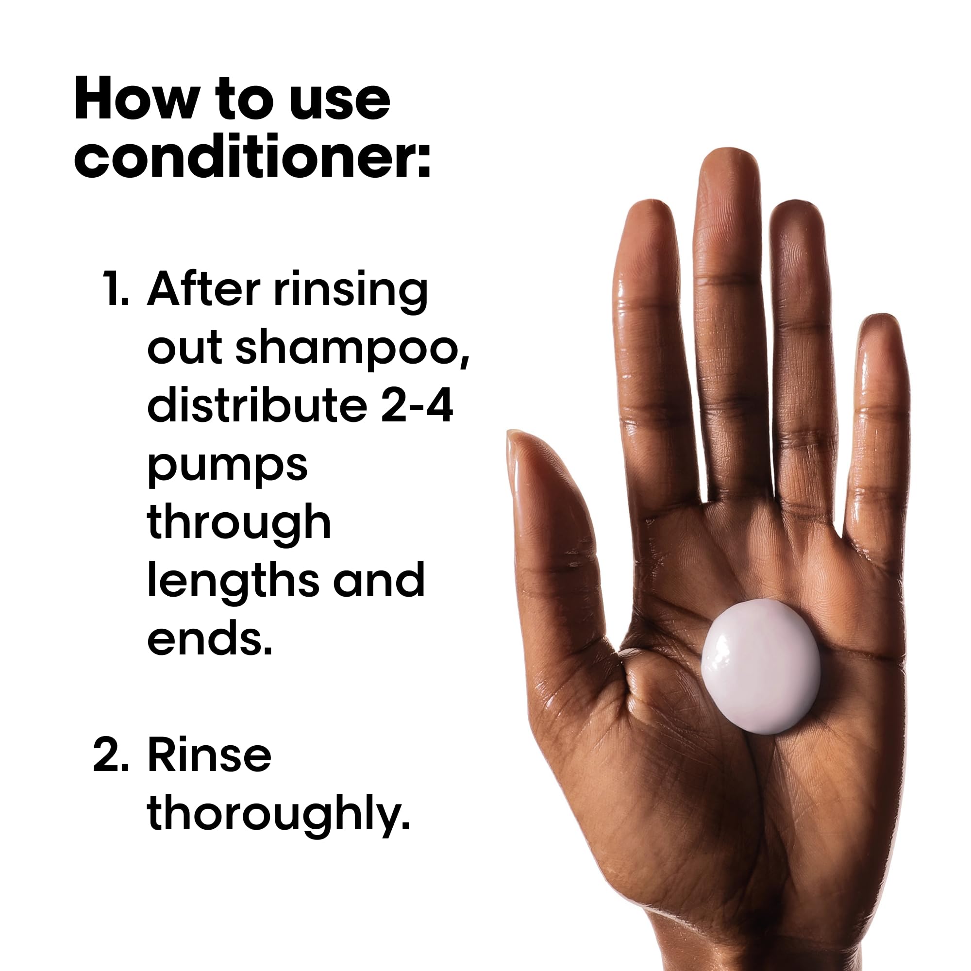 Applying Vitamino Color Conditioner from mid-lengths to ends for smooth, color-safe detangling.