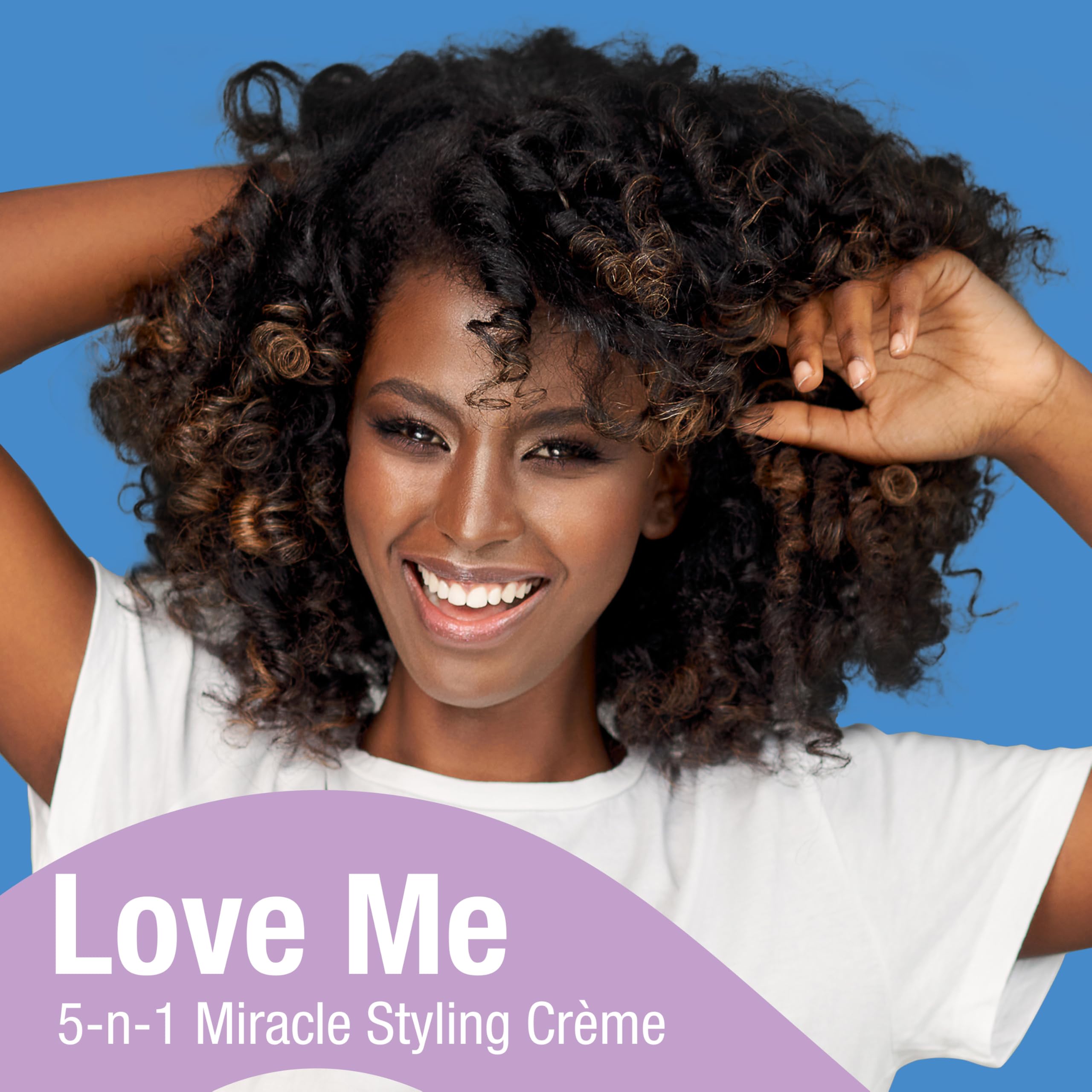 Lottabody Love Me 5-n-1 mist applied to damp hair for detangling prep.