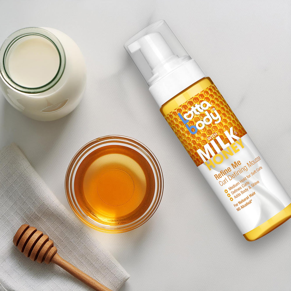 Compact 7 oz bottle ideal for on-the-go curl refresh and styling.