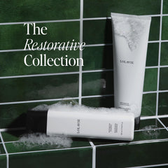 LolaVie Restorative Conditioner bottle top view shows moisture-boosting care.