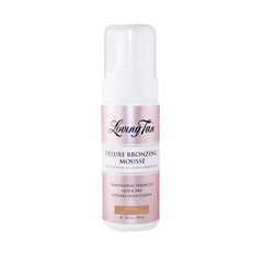 Loving Tan Deluxe self tanning mousse bottle displays a natural bronze color for a sunless tan