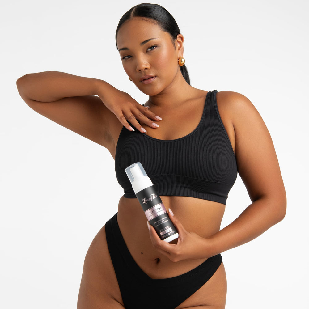 Loving Tan Platinum Self-Tanning Mousse with mitt for smooth, streak-free coverage.