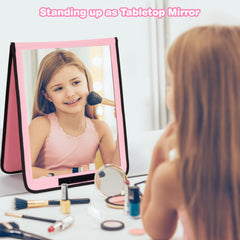 LPHUMEX pink mirror hanging on a garment rack for quick costume checks.
