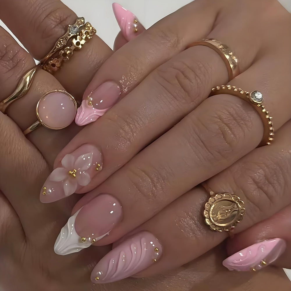 LPOODDNU embossed flower and gold bead designs on pink nails for elegance.