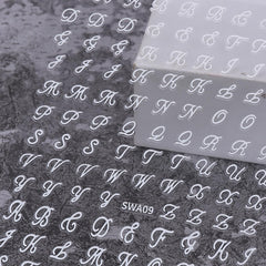 Lukmexor letras alfabeto oro para uñas, ideal para estilo retro diario.