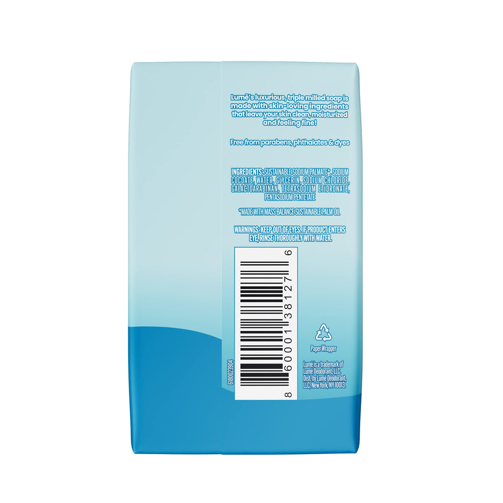 Lume bar soap showing dense, creamy lather for a luxurious wash.