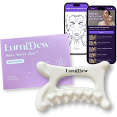 LumiDew ceramic gua sha gliding on the face for smoother contours and refreshed skin.