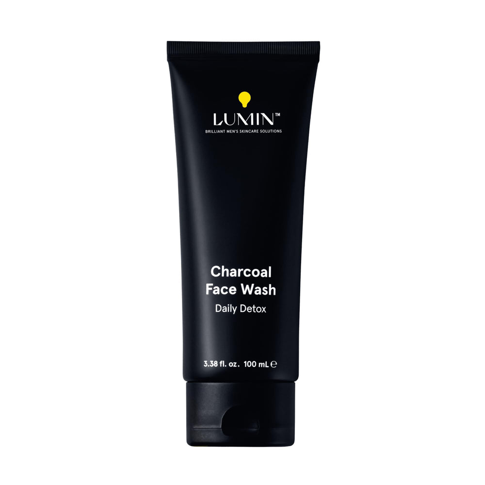 Lumin Charcoal Face Wash bottle close-up, detox cleansing emphasis.