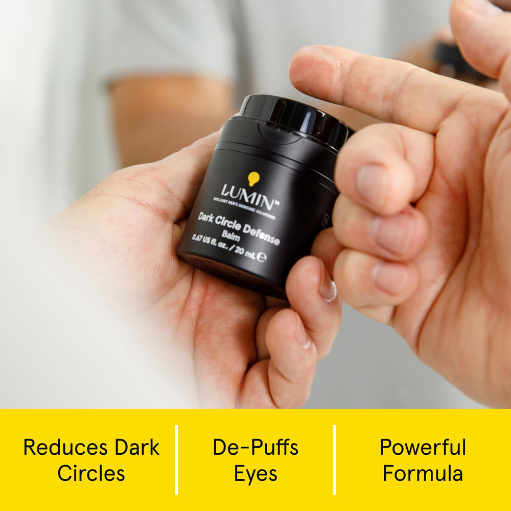 Lumin Men's Dark Circle Defense Balm during daily application targeting puffiness