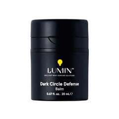 Lumin Men's Dark Circle Defense Balm tube close-up showing lightweight under-eye hydration