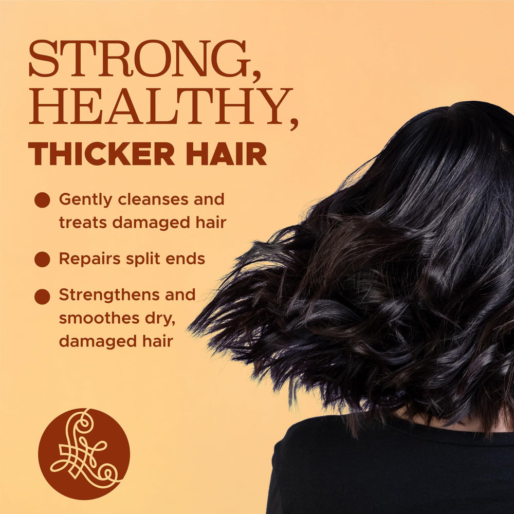 Luseta turmeric collagen conditioner bottle for smoother, hydrated strands.