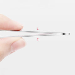 LUXXII silver-tone tweezers shown for clean brow shaping.