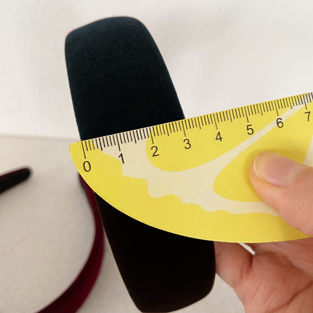 Lvyeer black velvet headband, travel-friendly compact packaging.