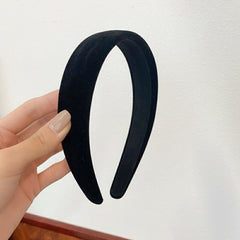 Lvyeer velvet headband on model demonstrates versatile styling for outfits.
