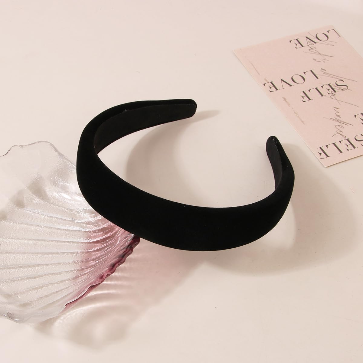 Lvyeer packaged velvet headband with care guidance included.
