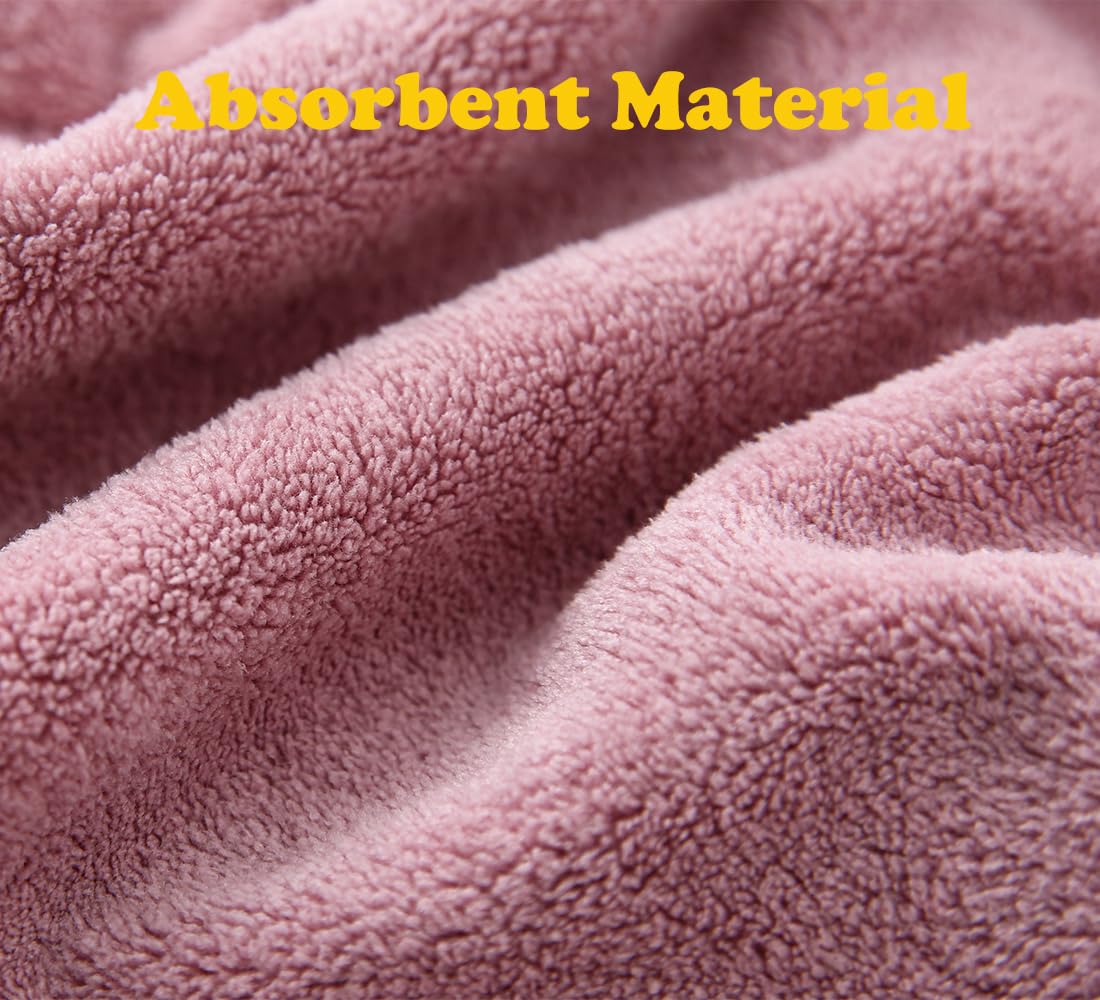 M-bestl turban-style hair wrap with button close-up securing hair.