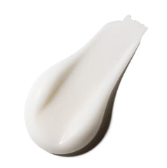MAC Studio Fix Mattifine 12HR primer on the face highlights smooth canvas for makeup wear.
