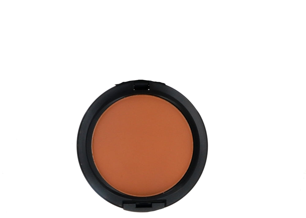 MAC Studio Fix NW43 being applied with a brush for a long-lasting matte look