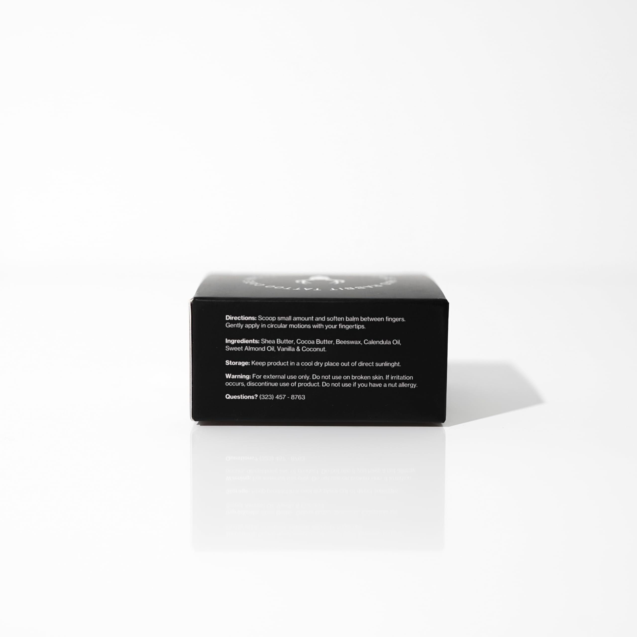 Mad Rabbit bottle label detail emphasizes clean, ingredient-forward formula.