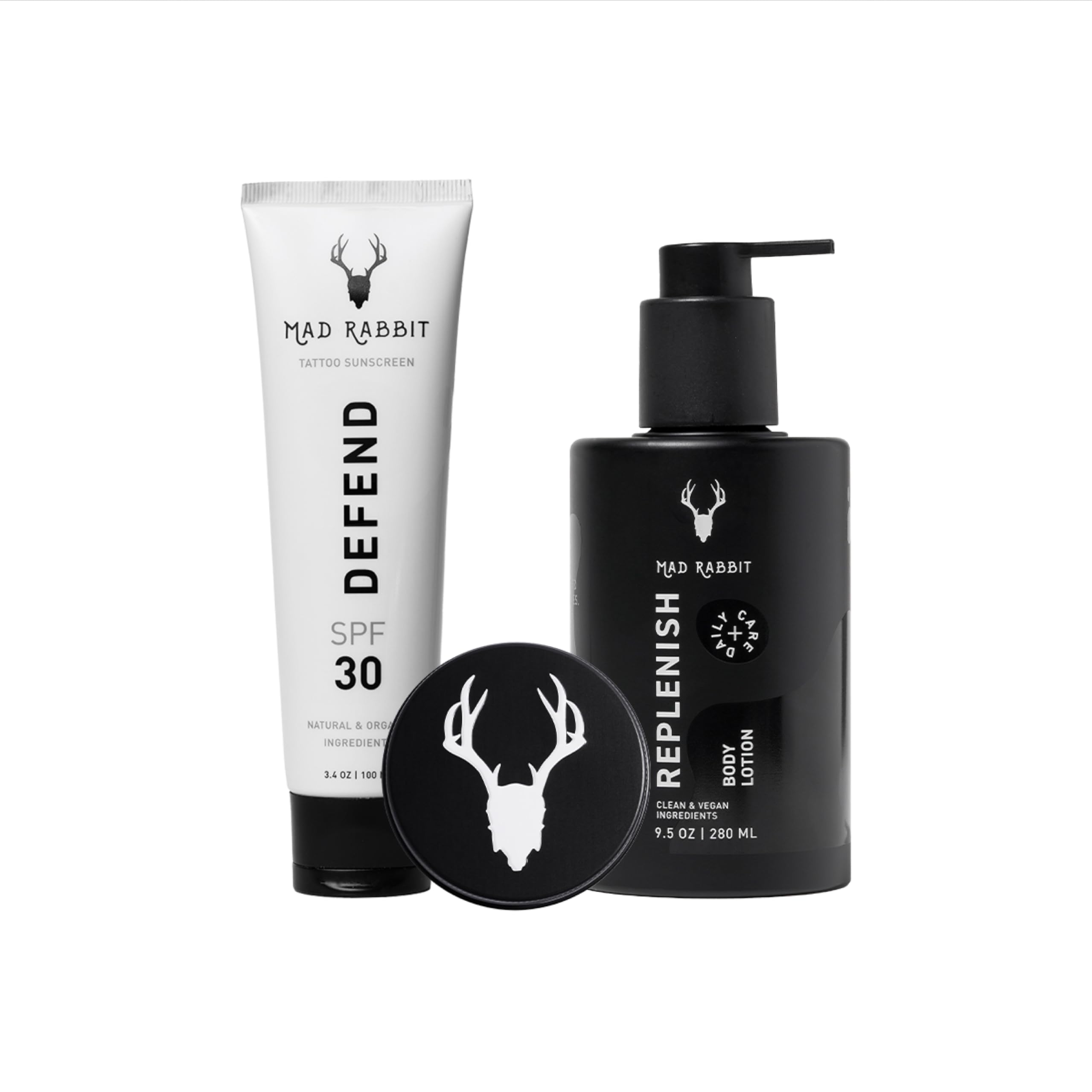 Mad Rabbit Enhance Balm close-up showing rich texture for vibrant tattoos.