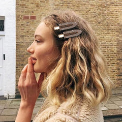 Magicsky rose gold clips add subtle sparkle during styling.