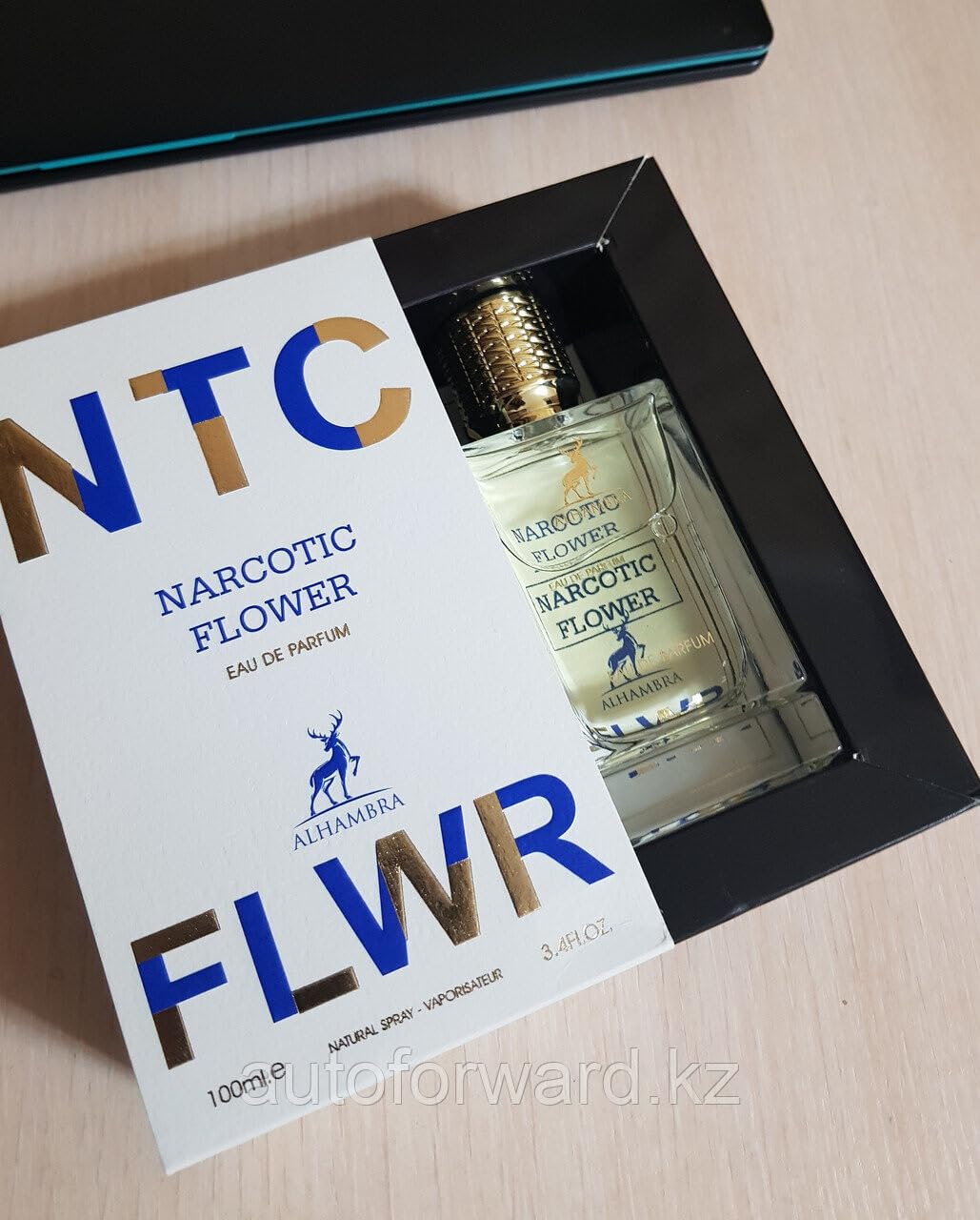 Close-up of Maison Alhambra Narcotic FLWR bottle highlighting floral aroma for daily wear.