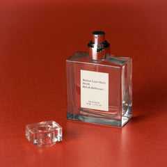 Maison Louis Marie No.04 Bois de Balincourt amber-toned bottle evokes woody notes