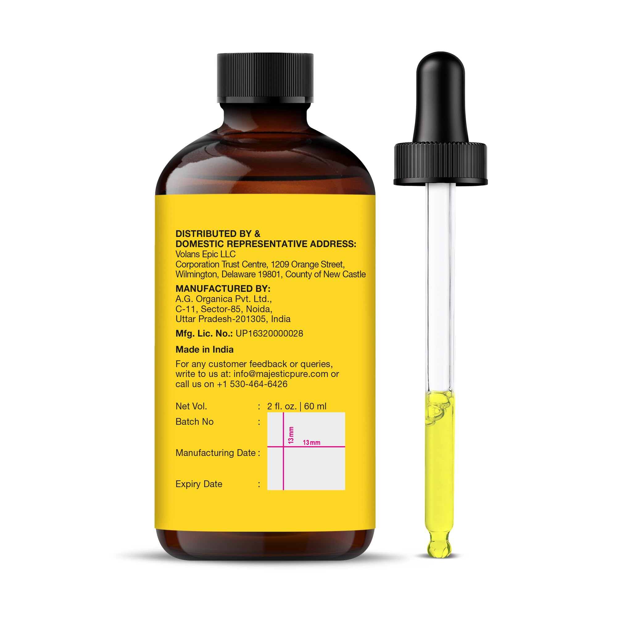 Majestic Pure Vitamin E Oil bottle alongside botanicals for wholesome skin care.