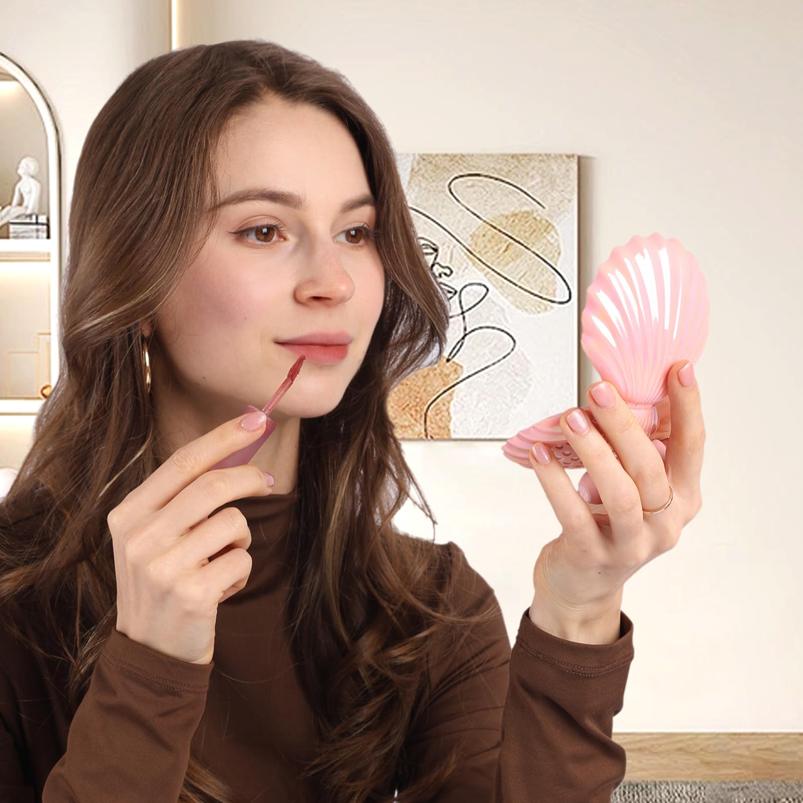 Maji Mama travel brush with built-in mirror, compact for quick checks.