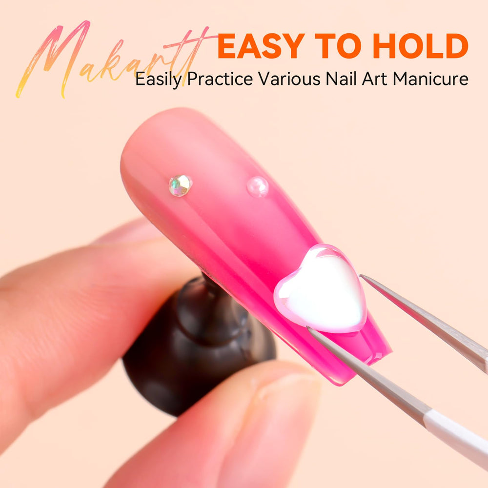 Makartt double-sided tape keeps nails securely in place while you design.