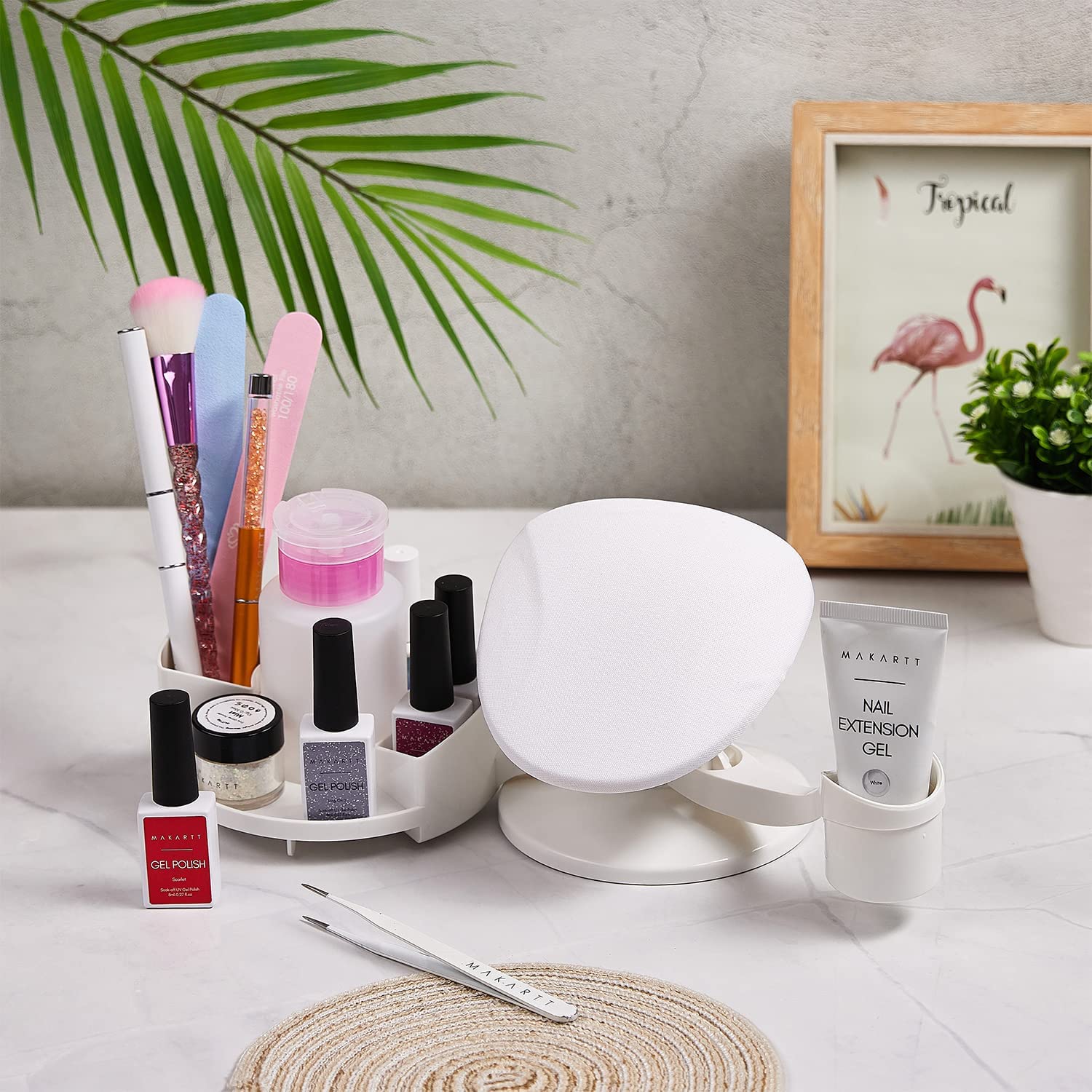 Makartt storage-compartments organize tools and bottles for quick manicures.
