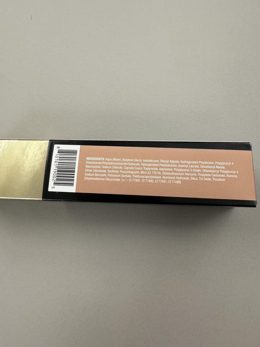 MAKE Diffusion Dew Skin Tint on vanity with soft lighting