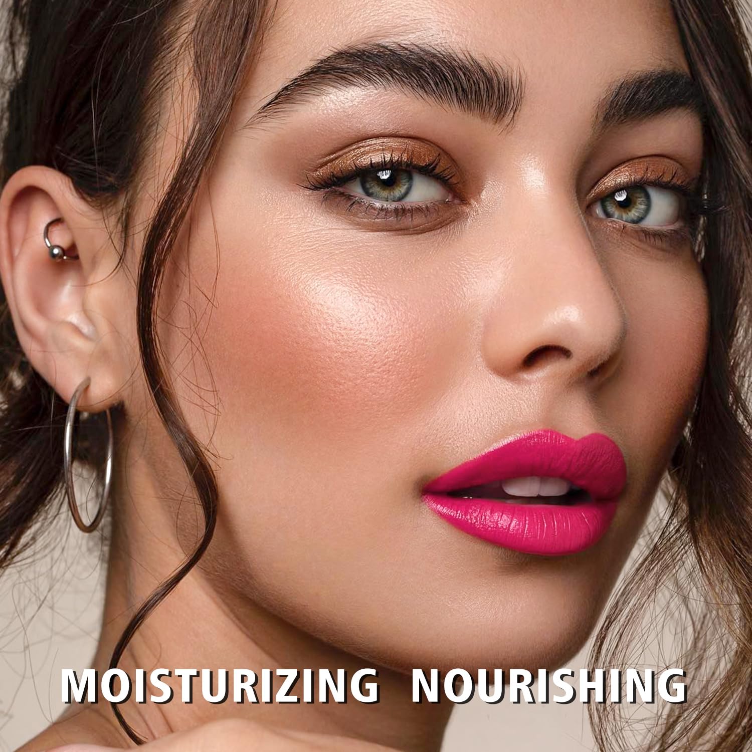 MAKI YIKA lipgloss swirl close-up highlights vibrant pink shade and hydrating formula.