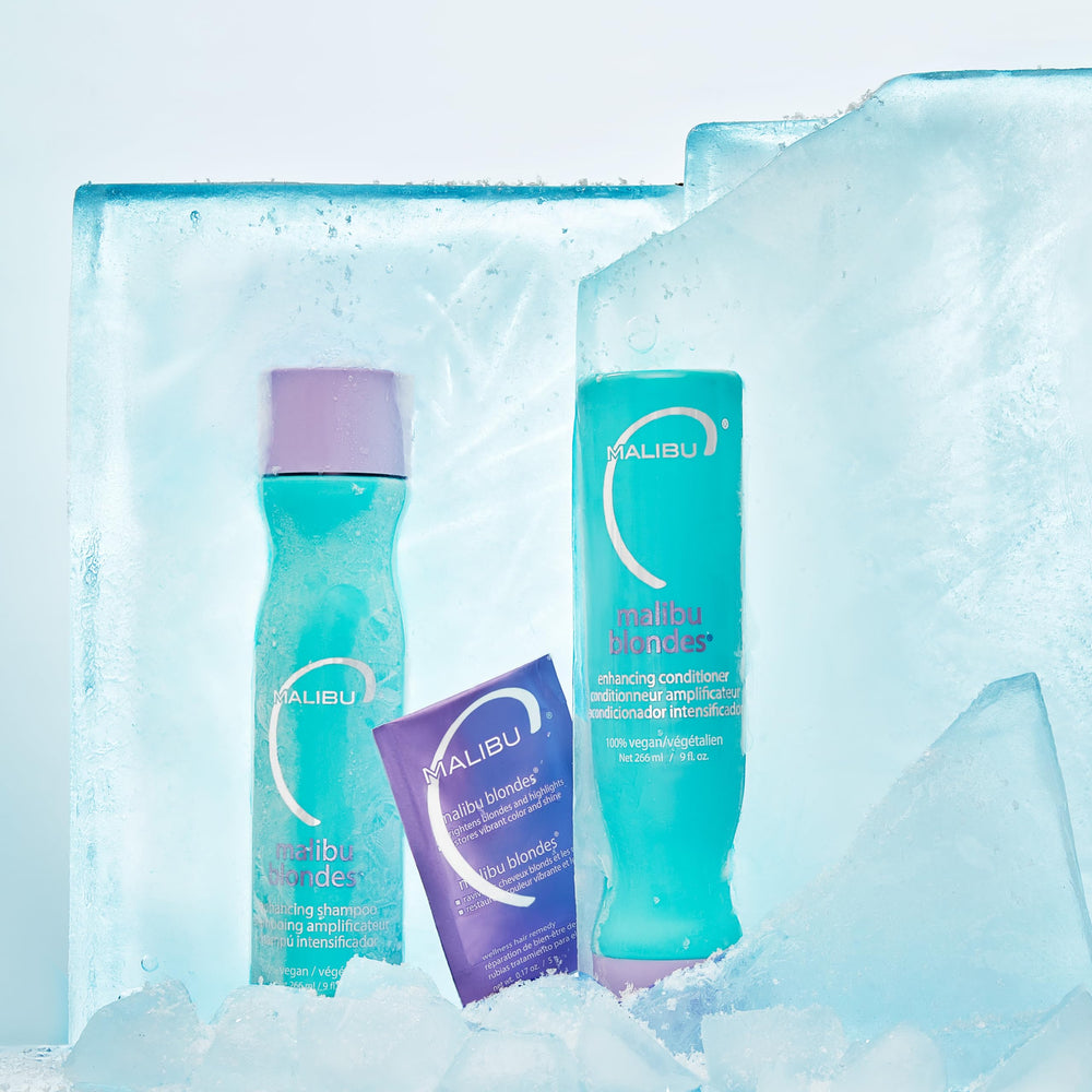 Purple conditioner bottle from Malibu C Blondes Collection for moisture and shine