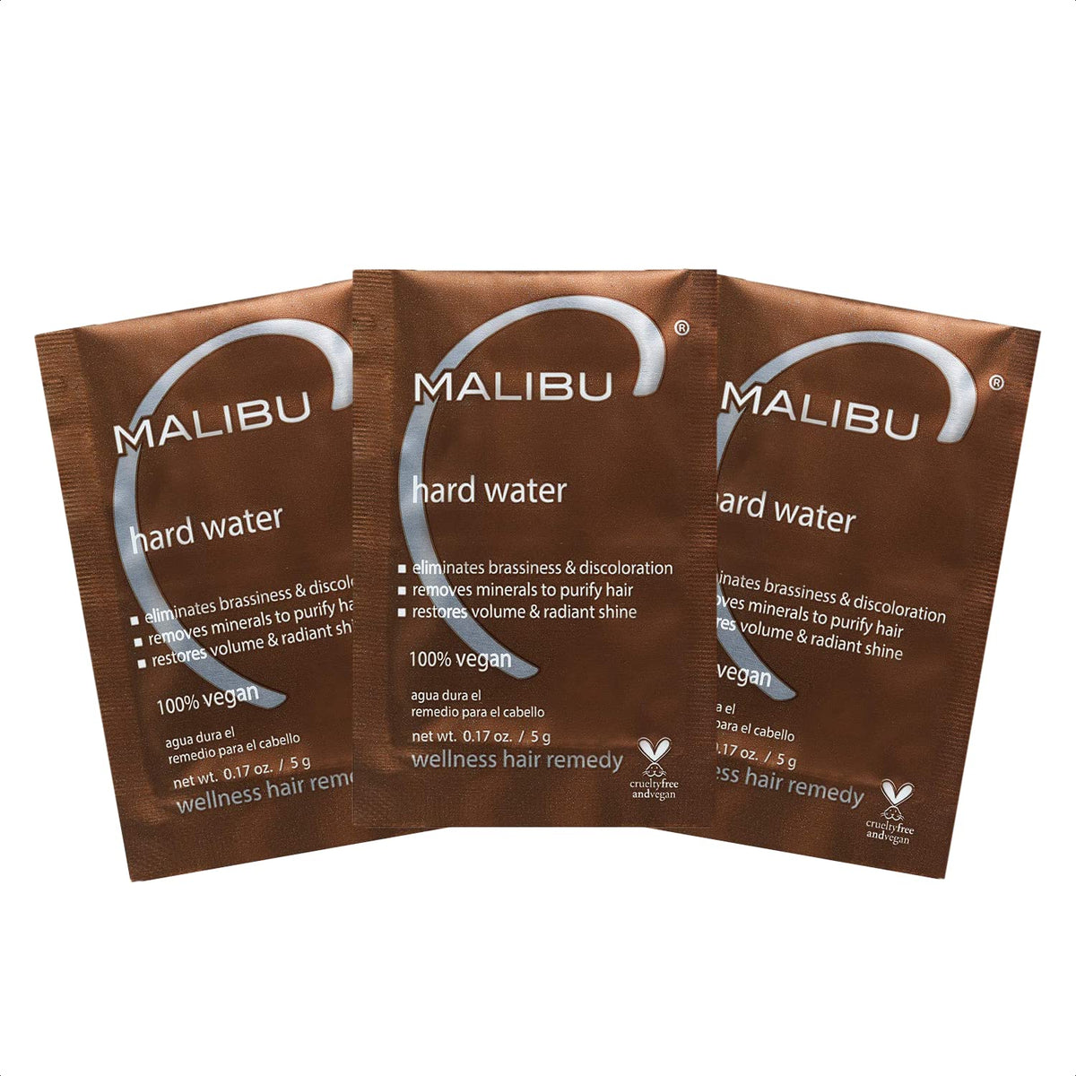 Malibu C Remedio Aguas Duras: botella con etiqueta, purifica minerales para cabello suave.